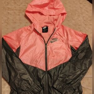 Girls use large Nike windbreaker